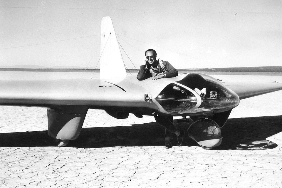 Harry Crosby stands inside the MX-334 during a lull in unpowered gliding tests in early 1944. Access hatches on the top and bottom gave Crosby a unique opportunity to add scale to the glider as it rested on the parched, cracked surface of Muroc Dry Lake. (USAF Flight Test Center Archives)