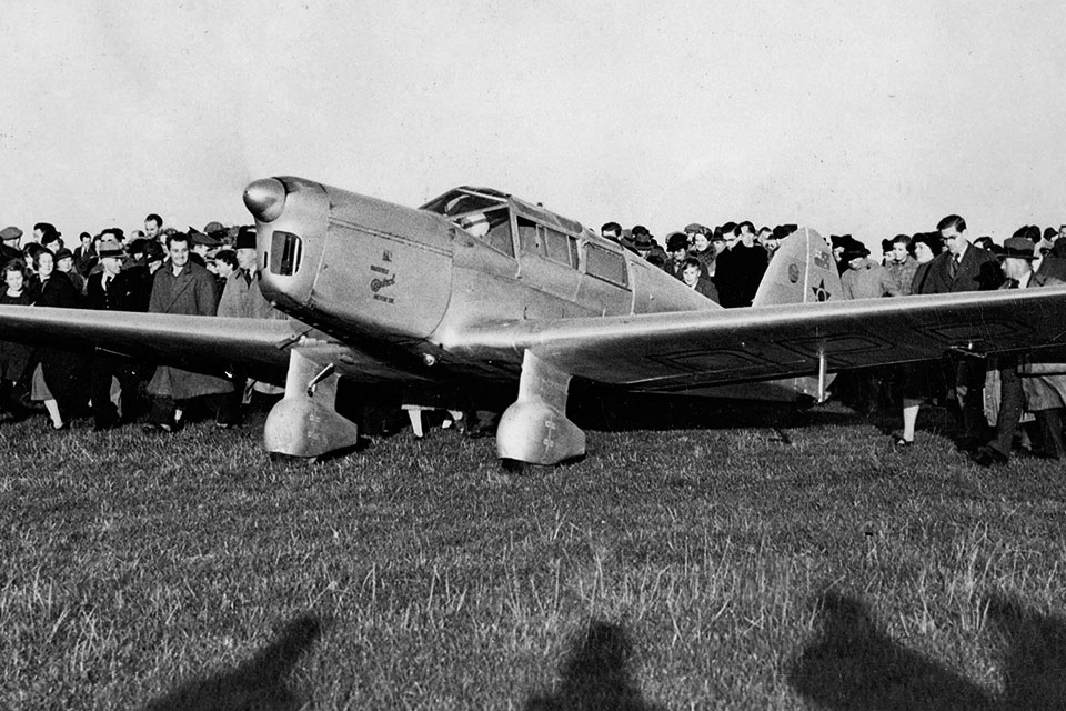 Welcomed by a crowd of onlookers, Batten touches down in Lympne, England, after her solo-flight record from Australia to England. (Imagno/Getty Images)