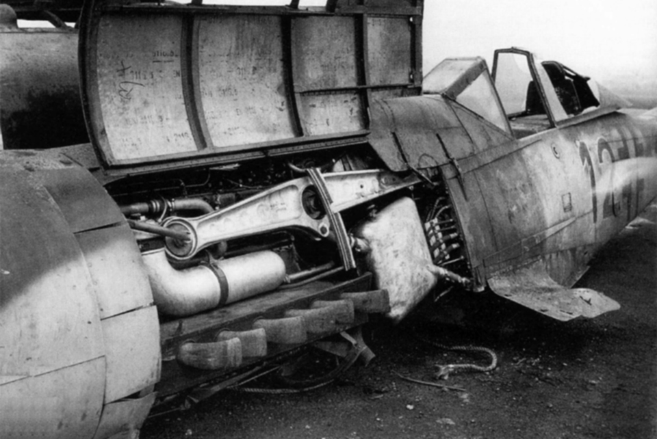 2nd Lt. Theo Nibel became a POW after he belly-landed this Focke-Wulf Fw-190D-9 at Grimbergen. On inspection it was discovered that a bird had flown into his radiator at low altitude, bringing him down. (HistoryNet Archive)