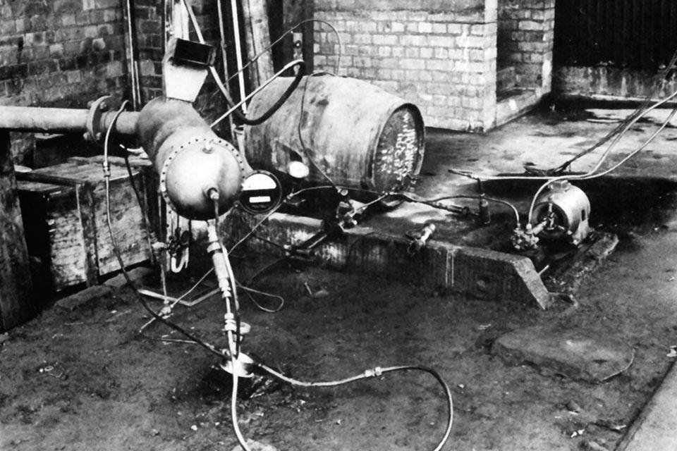 One of Whittle’s combustion test rigs at the British Thomson-Houston facility shows the primitive conditions he labored under during his early experiments. (Weider History Group Archives)