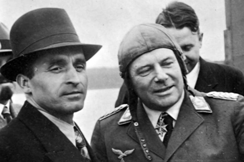 Vogt (left) confers with pilot Ernst Udet at a flying demonstration. (Courtesy Wolfgang Muelbauer)