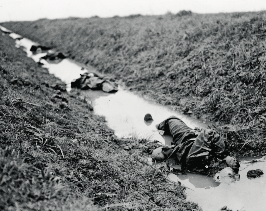  In the calm after the battle, German dead lie in a trench in the 45th Division sector. The fight proved costly to both sides. (National Archives)