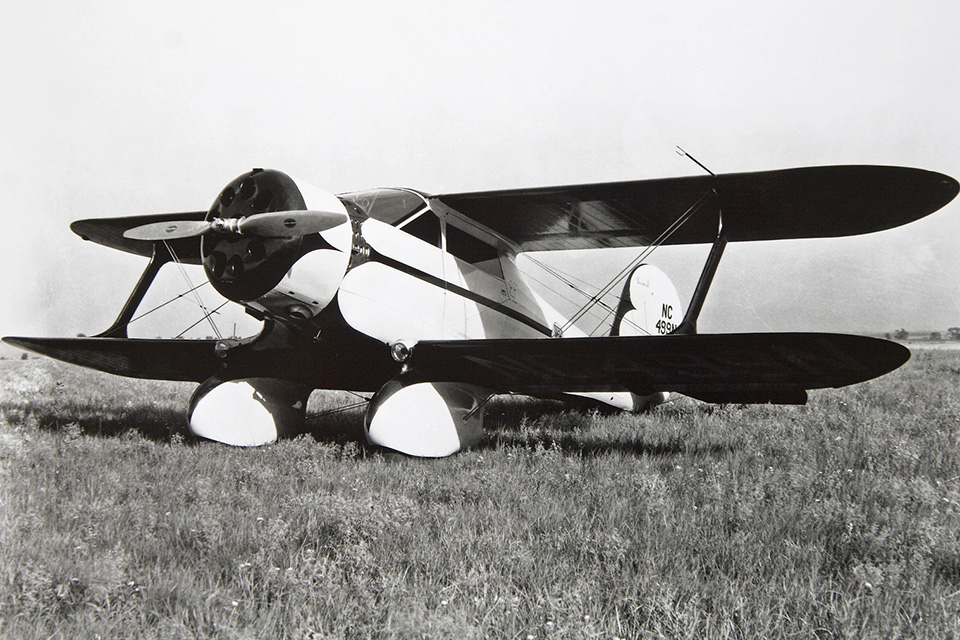 The prototype Staggerwing had fixed landing gear and huge wheelpants. (Beech)