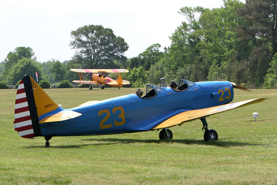 The Military Aviation Museum's airfield can become a busy place during the weekend airshow. A Fairchild PT-19 and a canary yellow Stearman taxi out to give a lucky few an aerial view of the event. (Guy Aceto)