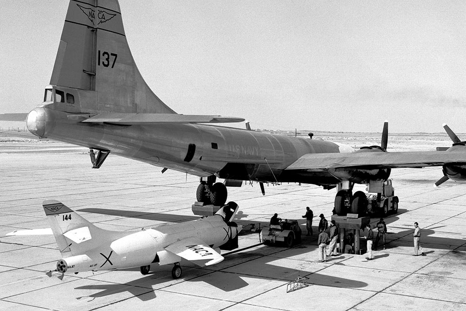 Crews prepare to mate the D-558-2 to its mother ship in August 1953, during high-Mach, high altitude tests by Marine Lt. Col. Marion Carl. (NASA photo)
