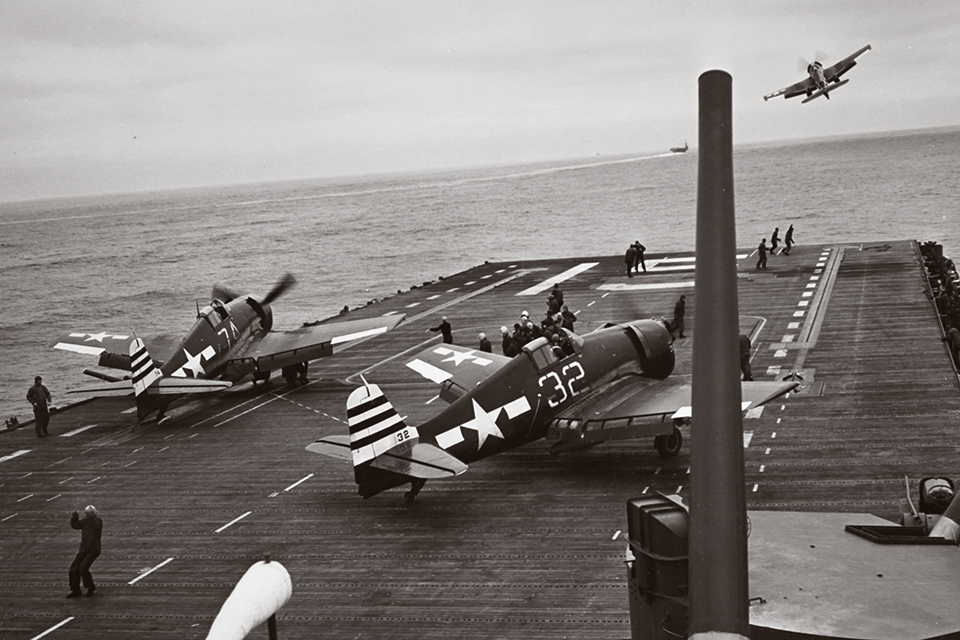 Hellcat no. 32 of VBF-12 prepares to take off from the carrier Randolph in May 1945. (Courtesy Flying Heritage Collection)