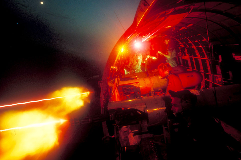 An AC-47 cuts loose on an enemy target with two of its three GE GAU-2/A miniguns. (Larry Burrows/Getty Images)