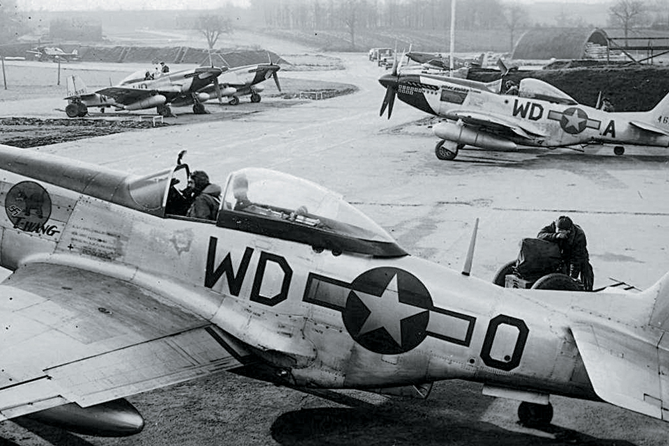 P-51Ds of the 335th Fighter Squadron, which Blakeslee had commanded after the Eagle squadrons were transferred, prepare to take off in early 1945. (National Archives)