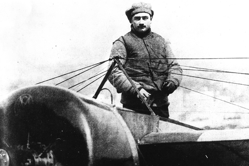 Roland Garros stands in his Morane-Saulnier H, in which he became the first to cross the Mediterranean Sea by airplane on Sept 23, 1913. (National Archives)