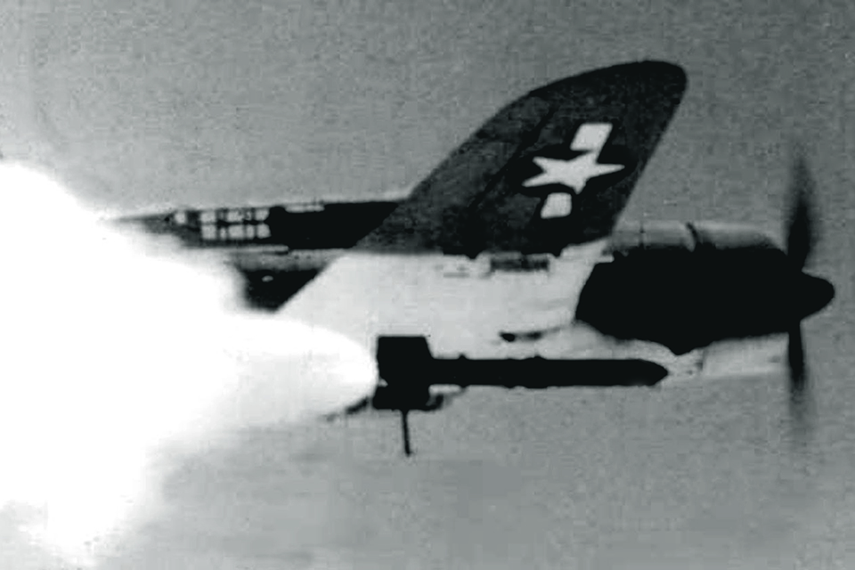 An SB2C-1C Helldiver test-fires a Tiny Tim rocket, which became operational too late for World War II but saw brief use in Korea. (U.S. Navy)