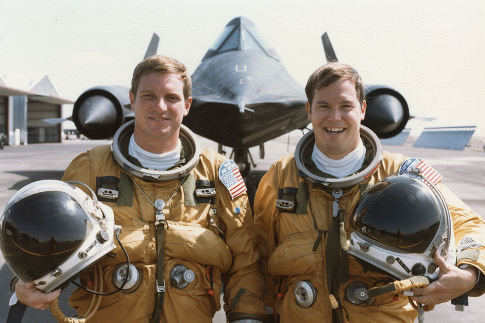 Pilot Joseph Matthews (left) and reconnaissance systems operator Curt Osterheld pose with their Blackbird. (Courtesy Curt Osterheld)
