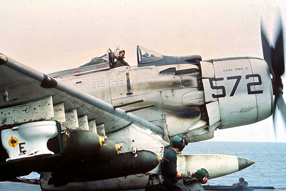 Cmdr. Clarence Stoddard Jr. of attack squadron VA-25 is about to leave the USS Midway to bomb targets in North Vietnam with a unique weapons load. (U.S. Navy)