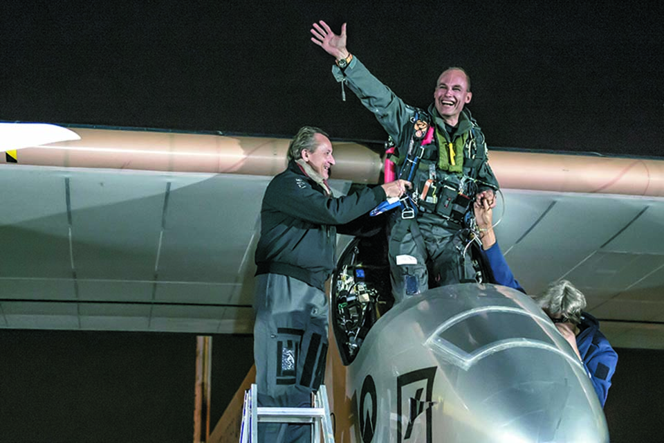 André Borschberg (left) and Bertrand Piccard celebrate after the landing at Dulles Airport in June 2013. (Jean Revillard/Rezo/SolarImpulse/Polaris)