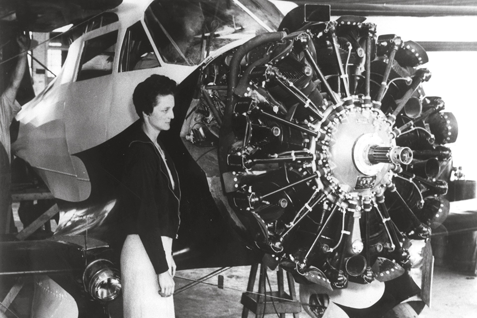 Aviatrix Louise Thaden stands beside the Beechcraft’s powerful Wright SR-1820F3 radial. (Staggerwing Museum Foundation/William Thaden and Pat Thaden-Webb/Special Collections &amp; Univ. Archives, Wichita State Univ. Libraries)