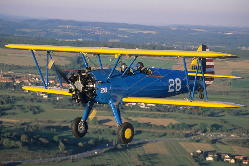 A restored PT-17 in original Army markings. The colorful biplanes still grace the skies throughout the U.S. (Thierry Grun-Aero/Alamy)