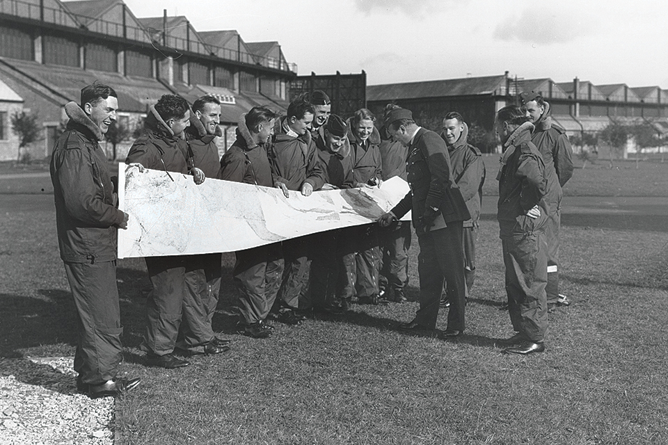 Crew members from all three aircraft hold a map of their route following the flight. (Charles Brown Collection, RAF Museum, Hendon)