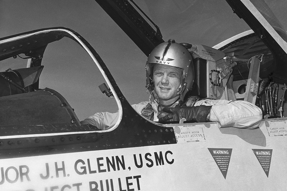 John Glenn sits in the F8U-1P in which he set a transcontinental speed record in July 1955. (Bettmann/Getty Images)