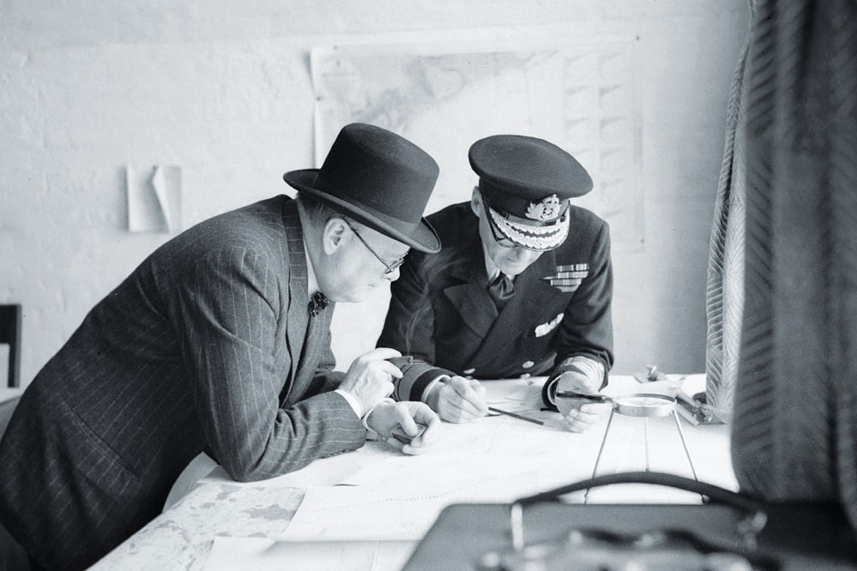 Ramsay confers with Prime Minister Winston Churchill at Dover Castle in 1940. (Imperial War Museums)