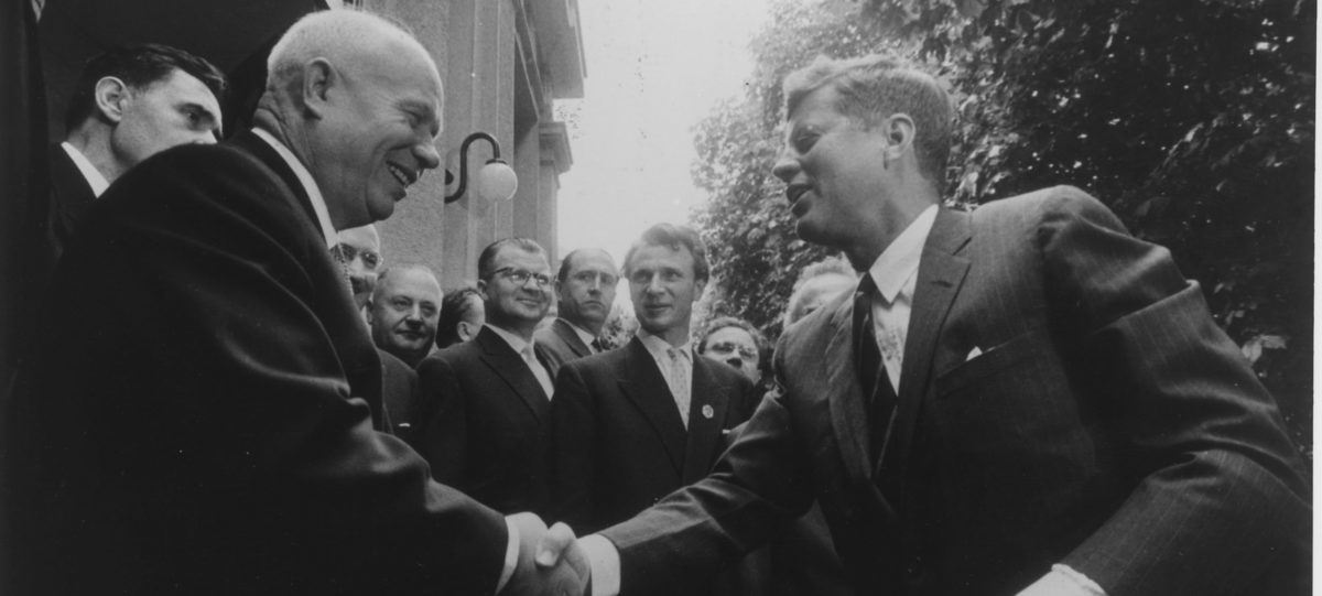 Kruschev and Kennedy shaking Hands Vienna 1961