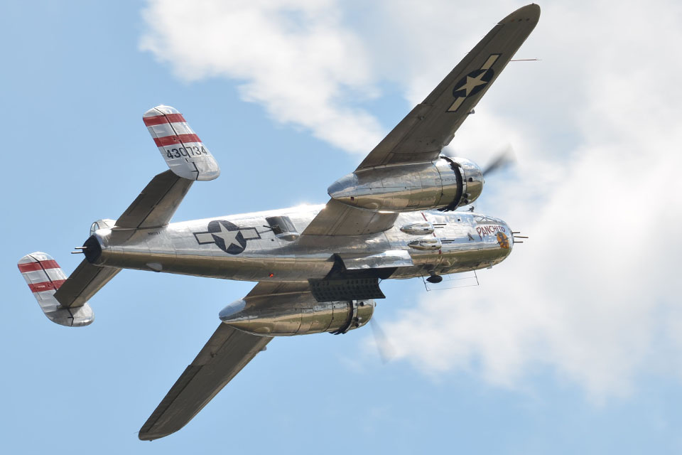 The Delaware Aviation Museum’s North American B-25J Mitchell “Panchito” heads for the clouds over Andrews. (Carl von Wodtke)