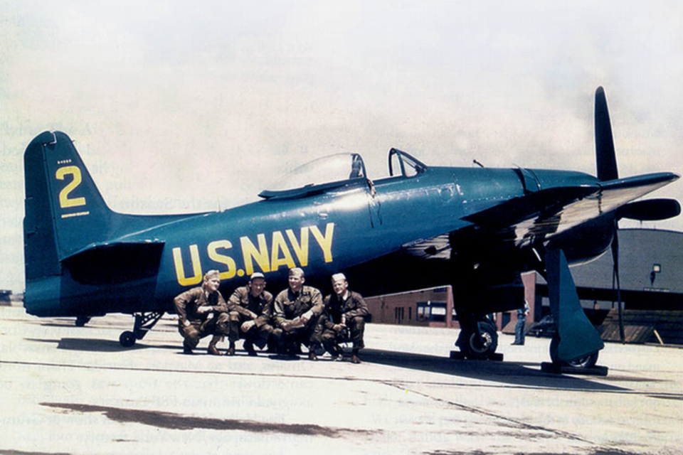 Members of a U.S. Navy Blue Angels aerobatic team pose with a Bearcat. The Blue Angels flew the F8F from August 1946 to July 1949, when it was replaced by the F9F-2 Panther. (U.S. Navy)