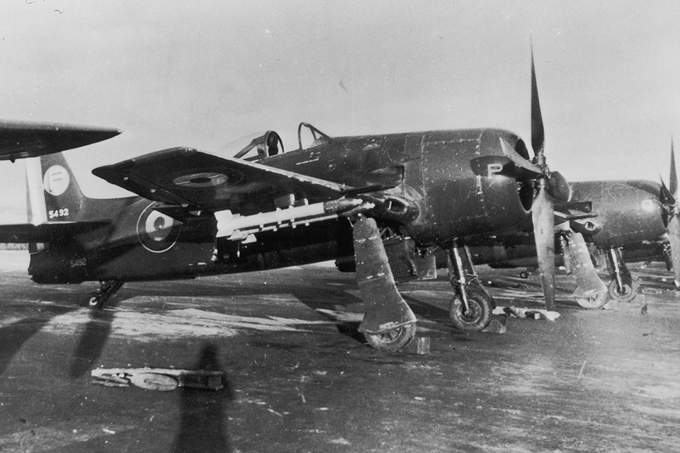 A French air force Bearcat equipped with rockets awaits a mission in Indochina. The F8F saw its only combat in Indochina, strafing and bombing Viet Minh ground targets in 1954. (Robert F. Dorr)