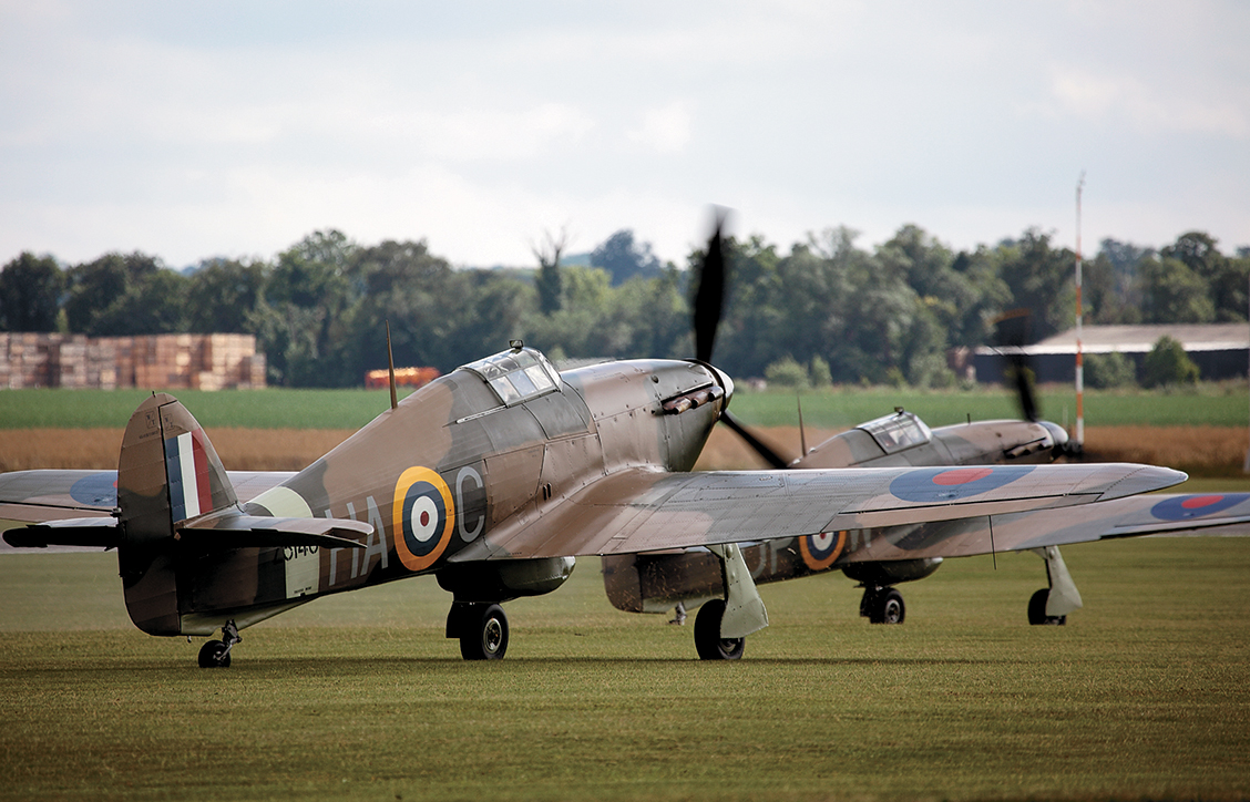 Two Hawker Hurricanes line up to take off at Duxford. (Andreas Zeitler)