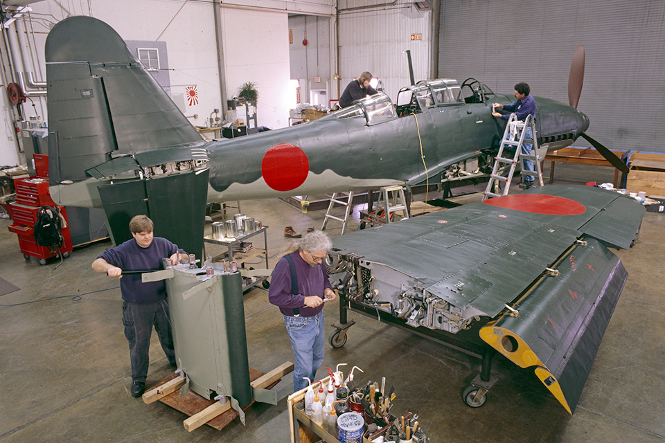 Specialists work to complete the restoration of the National Air and Space Museum's Seiran. (NASM/Eric Long)