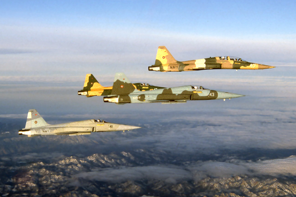Led by a two-seat Northrop F-5F, three single seat F-5E Tiger IIs head out for an early morning mission—to give Topgun students a run for their money over Southern California. (Dave Baranek)