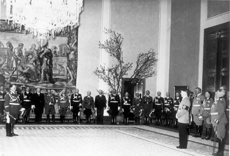 Germany's government leaders congratulate Hitler at celebration in Berlin.