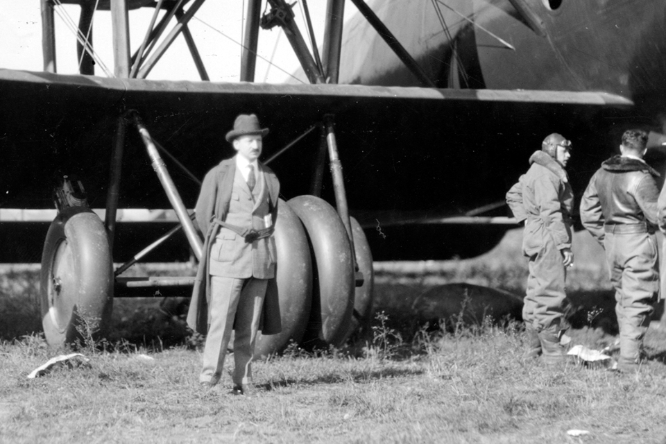 Barling stands before the oleo strut landing gear that distributed the bomber’s weight. (History of Aviation Collection, U. of Texas, Dallas)