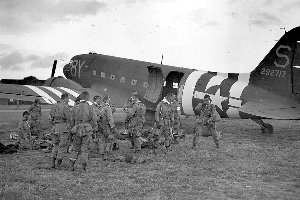 Paratroopers prepare to board a C-47 on June 5, 1944, for the airborne invasion of Normandy. (National Archives)