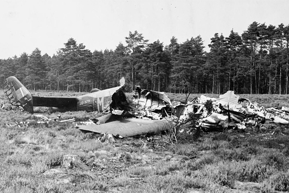 The wreckage of a Handley Page Halifax of No. 77 Squadron lies in a cleared fir plantation at Queloh, northwest of Eschede, Germany. Shot down on the night of August 24, 1943, the bomber was Schnaufer’s 25th victim. (IWM HU 25822)