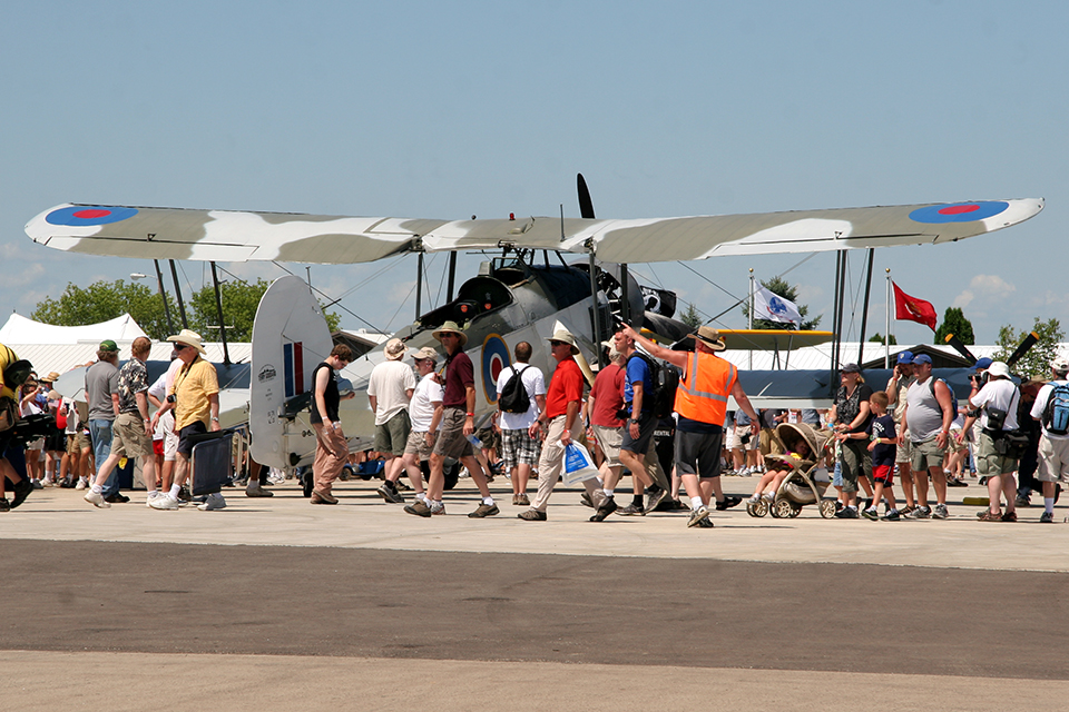 On arrival at Oshkosh, Vintage Wings’ “Stringbag” drew quite a crowd. (Guy Aceto)