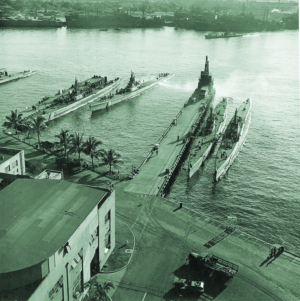 The sub base at Pearl Harbor was a bustling place by mid-1943, as large numbers of new submarines steamed in. (National Archives)