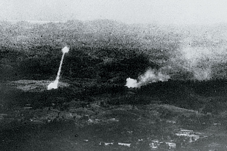 North Vietnamese SA-2 Guideline surface-to-air missiles take off after an American aircraft. The Soviet-made missile’s 300-pound high-explosive warhead rode atop a two-stage solid rocket fuel booster system. (Spectre Association)