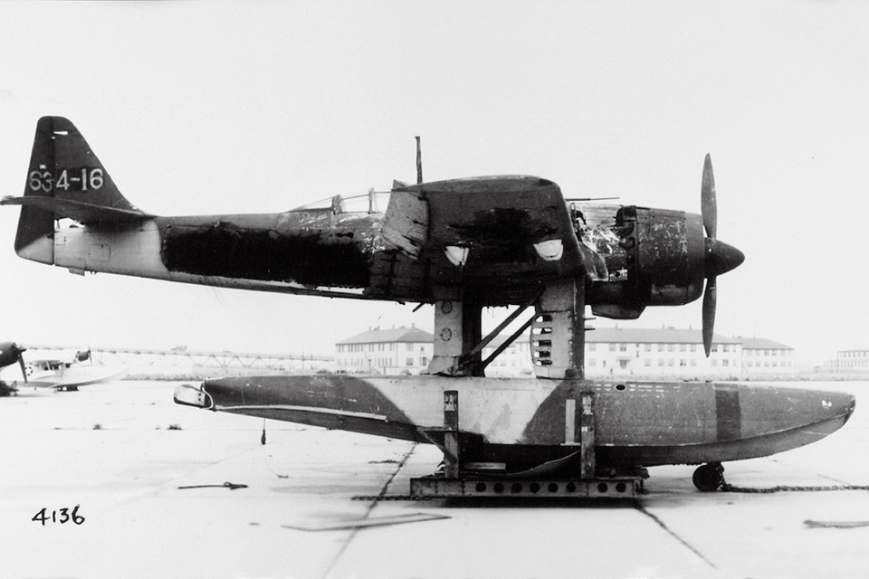 This captured Aichi E16A1, shows the ingenious folding dive brakes mounted on the forward struts that attach the aircraft to its floats. (U.S. Navy)