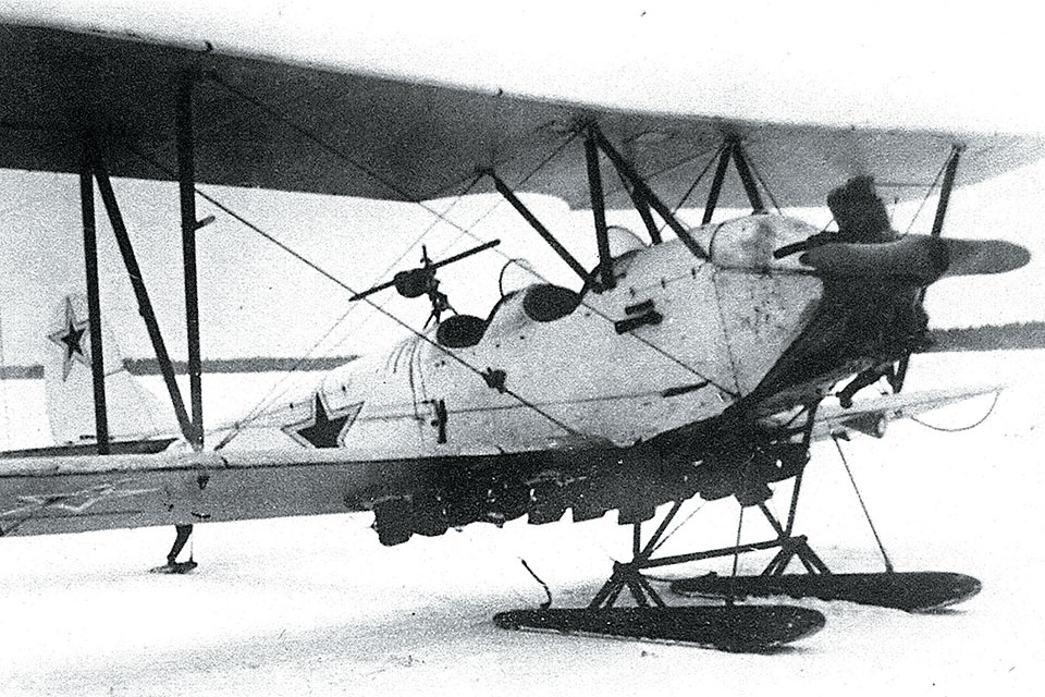 The rugged Polikarpov Po-2—here equipped with winter camouflage and skis—served myriad purposes. A total of 40,000 were produced. (Ratkin, Zolotov via FoxbatFiles.com)