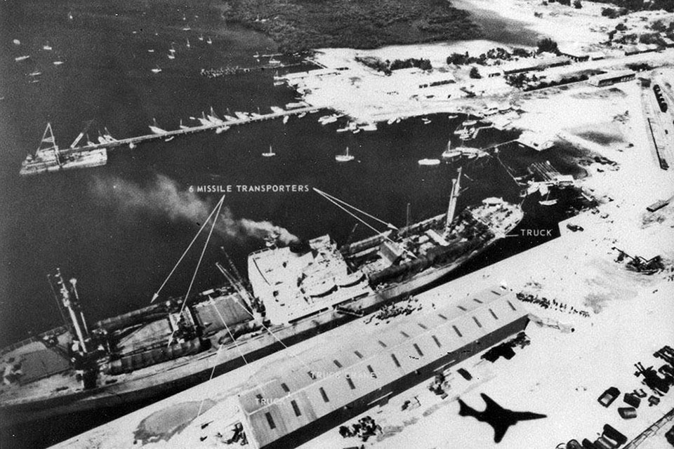 An RF-101 of the 363rd Tactical Reconnaissance Wing casts its shadow beside the missile-laden Soviet cargo ship is photographed in Port Casailda, Cuba, on November 6, 1962. (U.S. Air Force)
