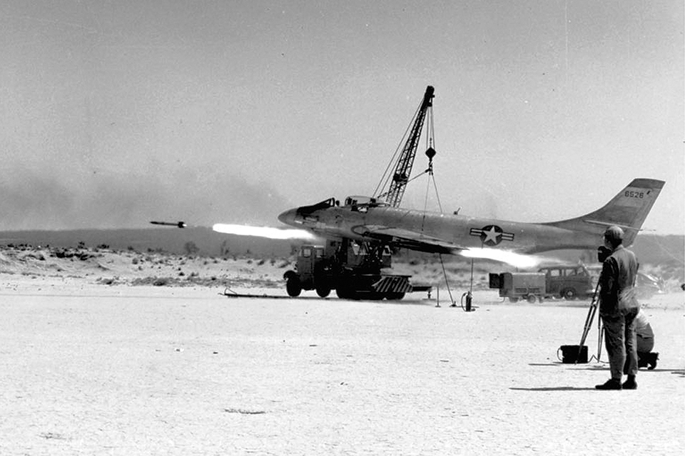 McDonnell’s second XF-88 “strategic penetration fighter” prototype fires its underwing rockets during armament testing. (U.S. Air Force)