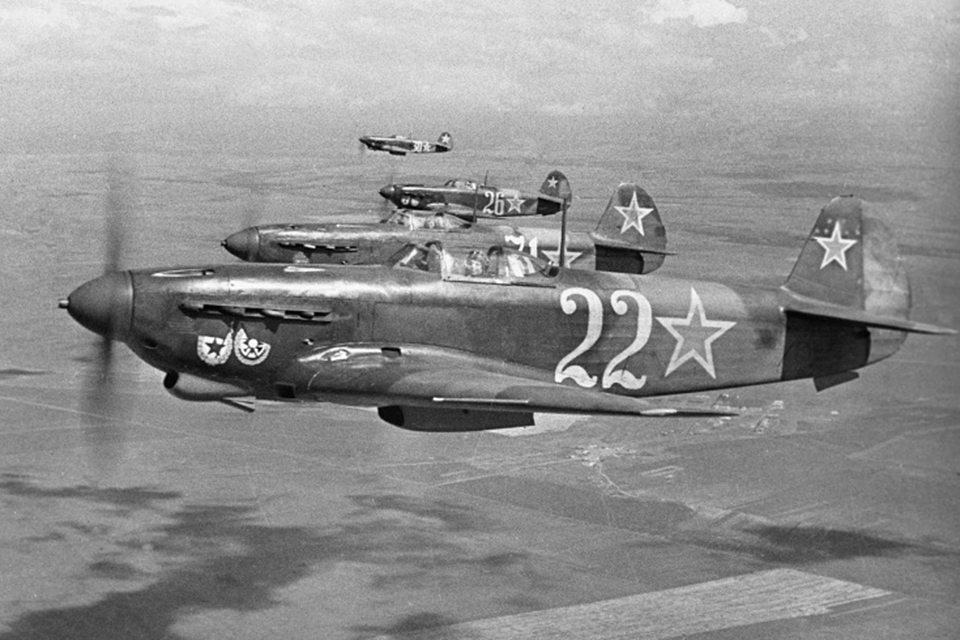 A flight of Yak-9D fighters, 3rd squadron of the 6th GIAP Air Force of the Black Sea Fleet, over Sevastopol, May 1944. (National Archives)