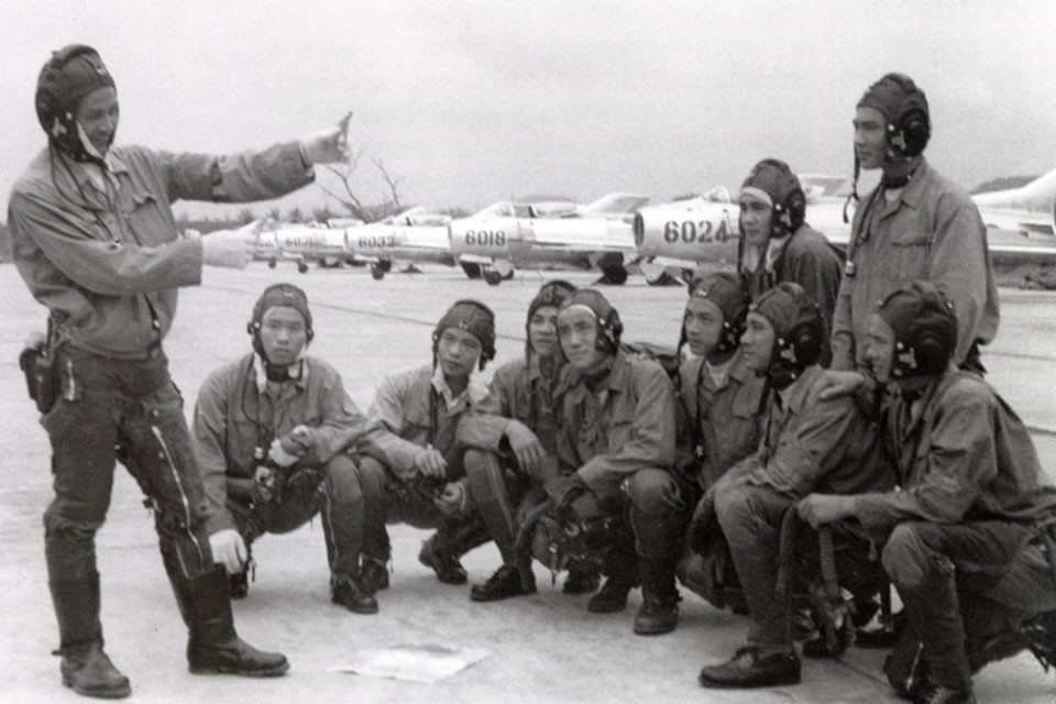 Pilots being breifed on tactics in front of a group of Chinese made MiG-19s, known as a Shenyang J6. These aircraft were supplied to the 925th FR in 1971, the only unit to operate the MiG 19. (National Museum of the U.S. Air Force