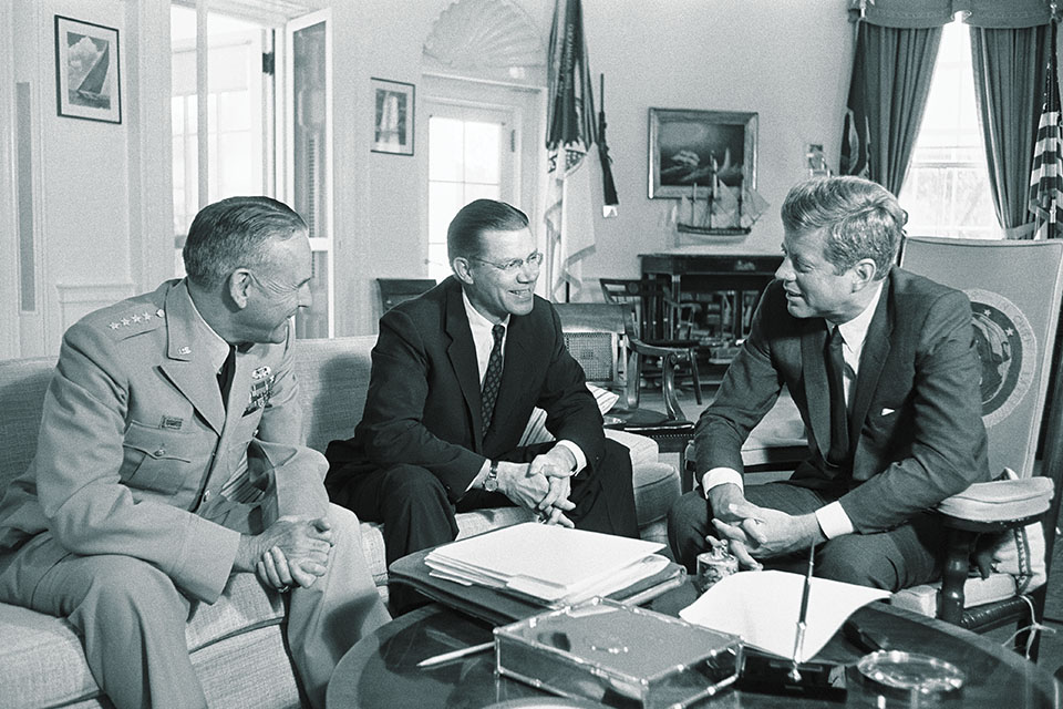 Joint Chiefs Chairman Taylor and Secretary of Defense Robert McNamara, just back from a trip to Vietnam, update President John F. Kennedy on Oct. 2, 1963. (Bettmann Getty Images)