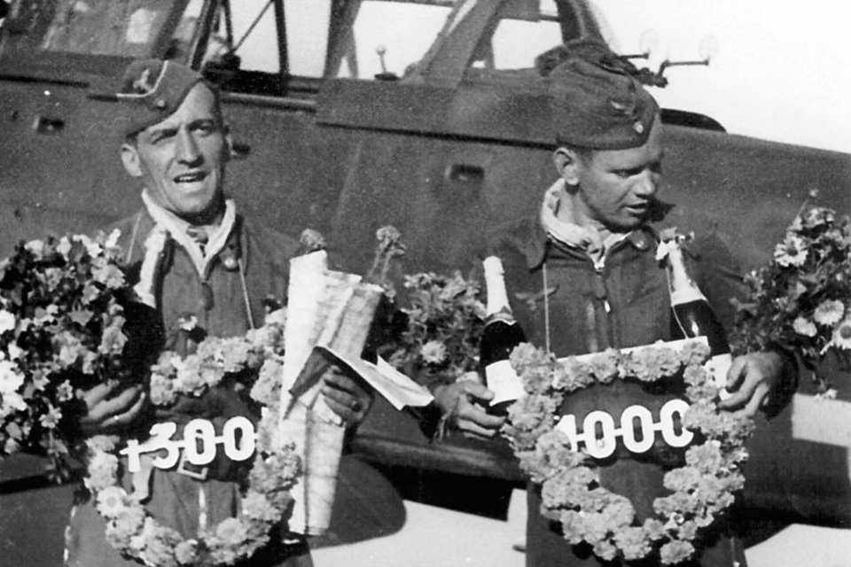 Marking his 1,300th mission, Rudel—who was a teetotaler—would have left the champagne to his backseater Erwin Hentschel, then celebrating his 1,000th. (National Archives)