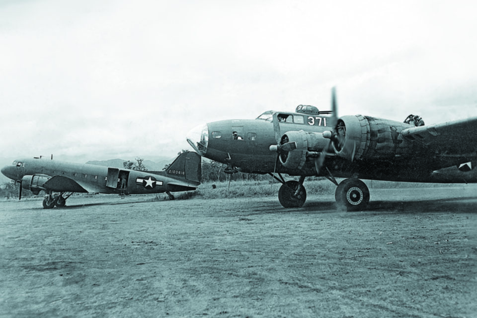 The B-17E "Cap’n & The Kids," a veteran of 81 bombing missions, joins the C-47s at Port Moresby to serve as an armed transport in the New Guinea area of the Southwest Pacific theater. (Dan Johnson Collection)