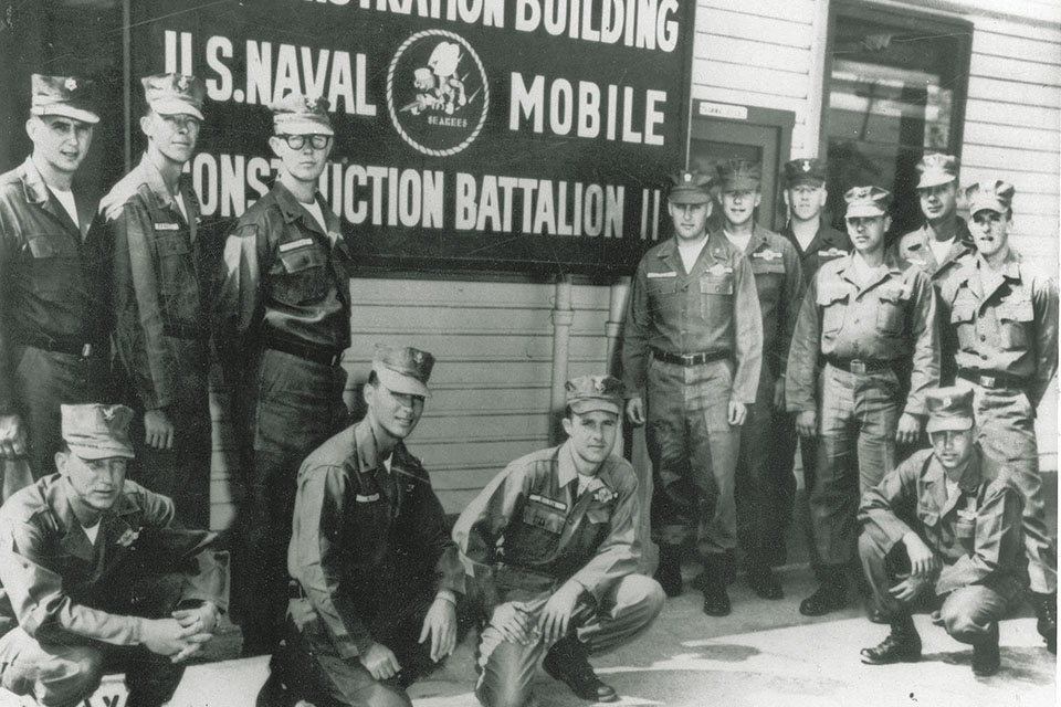 Naval Construction Battalion 11’s 13-member Seabee Team 1104, which was working on construction projects at the camp. (Naval History and Heritage Command)