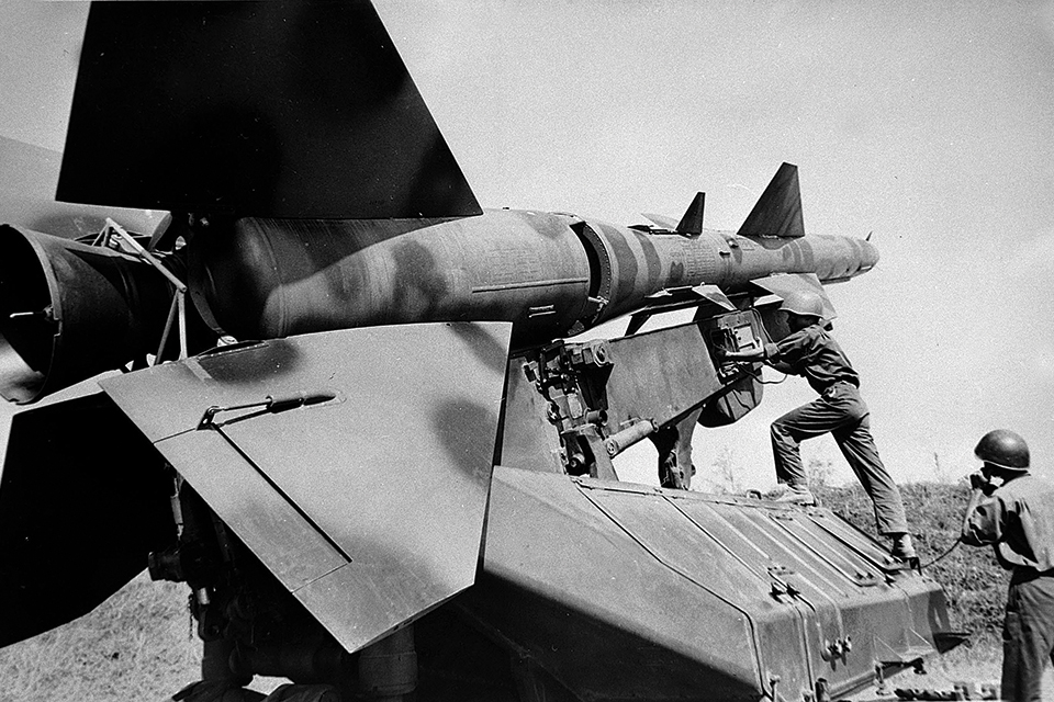 North Vietnamese soldiers prepare a Soviet-supplied SA-2 surface-to-air missile for action. (Popperfoto/Getty Images)