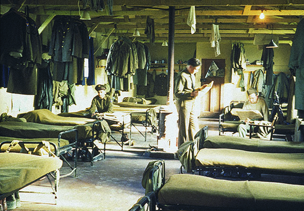Airmen relax in a sun-drenched barracks at Steeple Morden Airfield, home of the 355th Fighter Group. For Gray, flying a Mustang was “every pilot’s dream.” (Courtesy of Jeffrey Ethell)