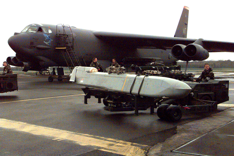 Although Strategic Air Command originally envisioned the B-52 as a strictly nuclear bomber, its operational weaponry ranged from iron bombs to cruise missiles like this conventional AGM-86C being loaded on a B-52H during Operation Allied Force in 1999. (U.S. Air Force)