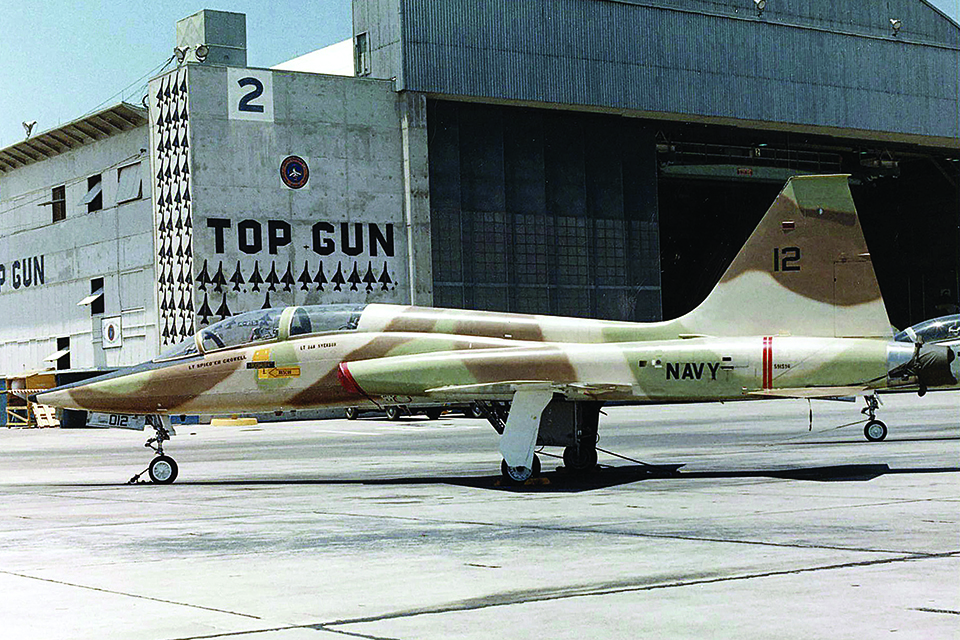 A Northrop T-38A Talon adversary aircraft parks in front of NAS Miramar’s Hangar 2. (Robert L. Lawson Photograph Collection, National Naval Aviation Museum)